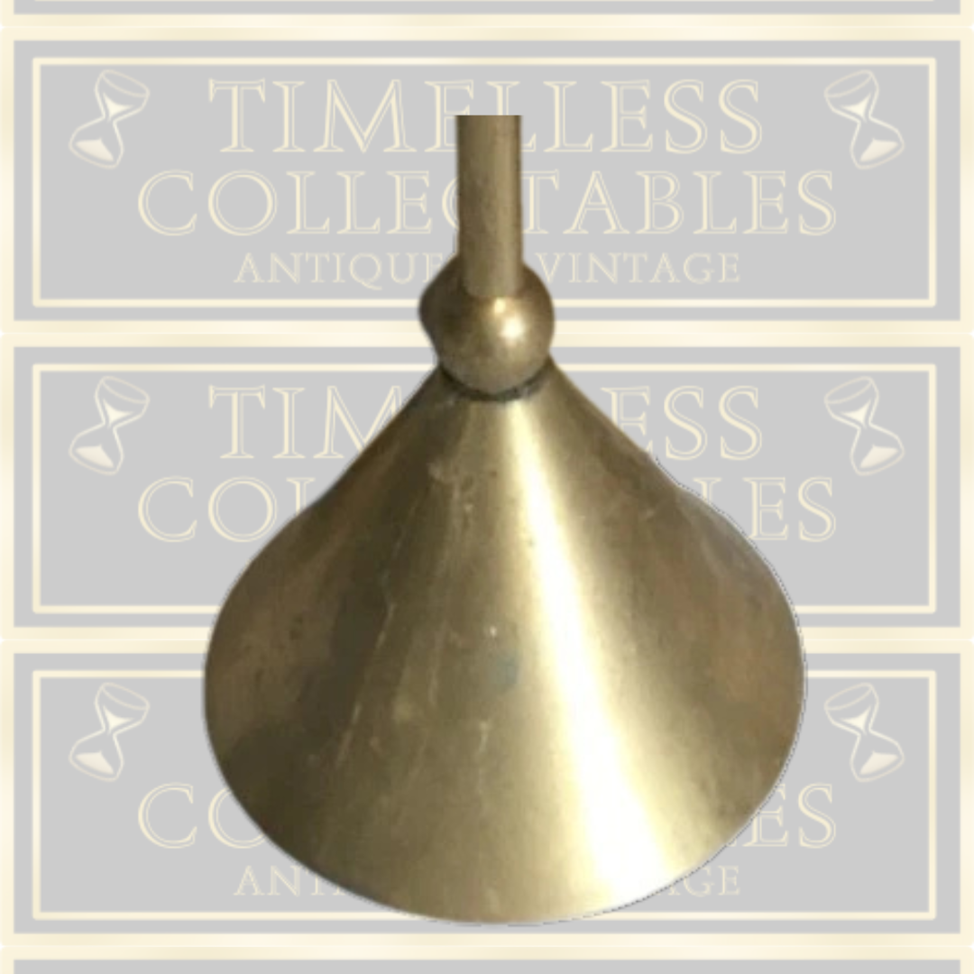 A Pair Of Brass Candle Holders