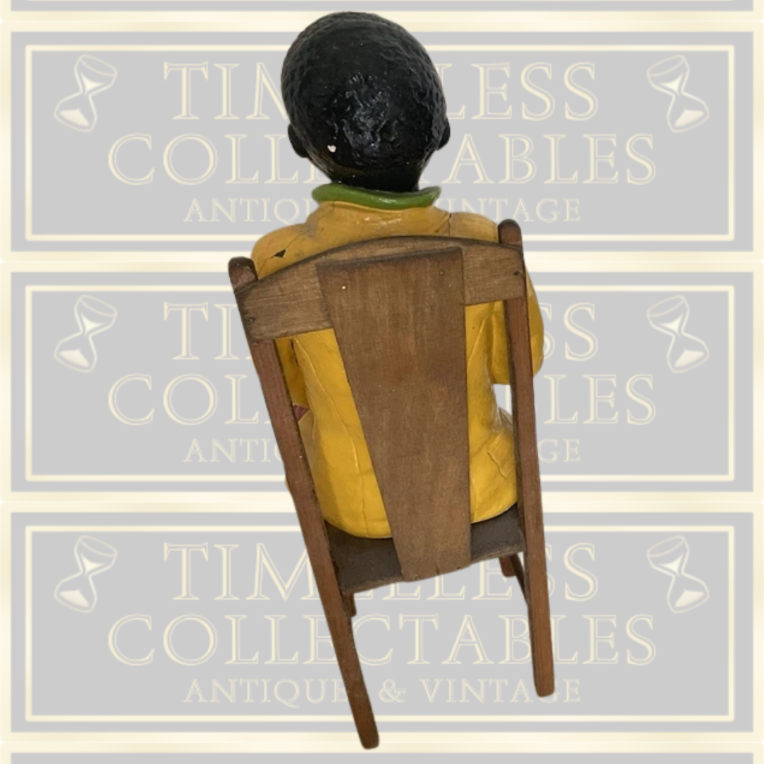 Antique Goldscheider Black Boy On A Wooden Chair