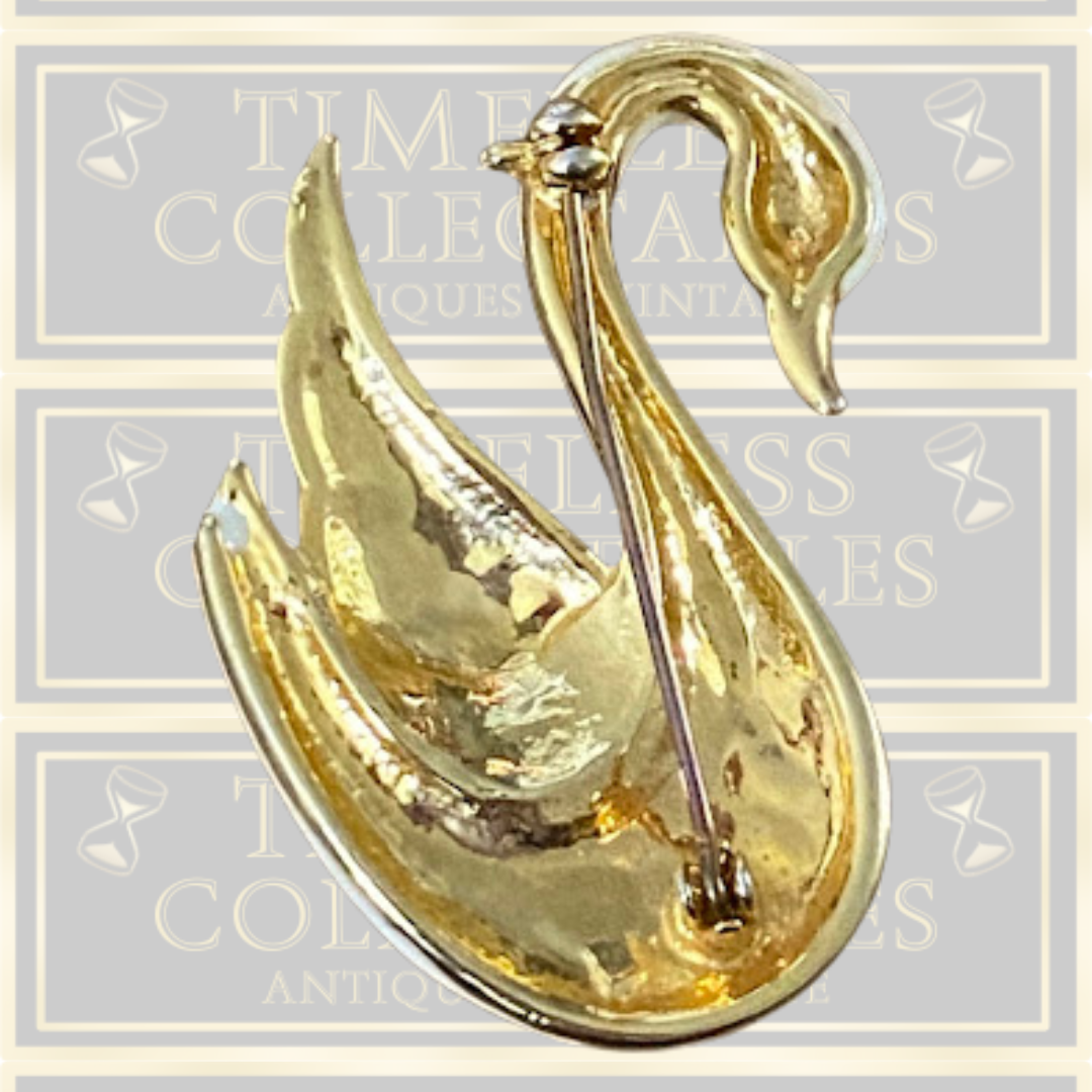 Vintage Gold-Plated Enamel Swan Brooch With Crystal-Encrusted Wings.
