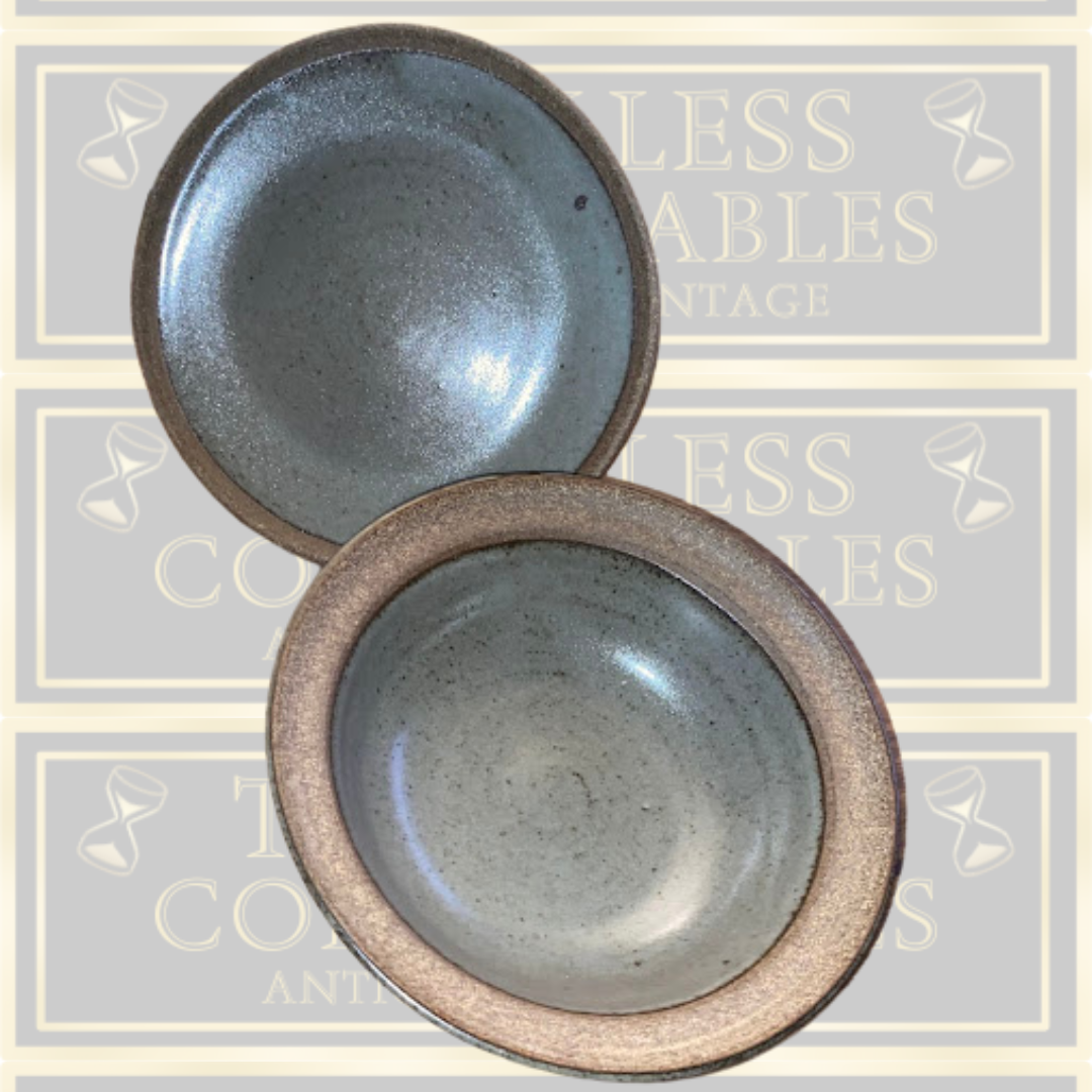Stoneware Lidded Bowl Featuring a sculptural, animal-themed handle on the lid.
