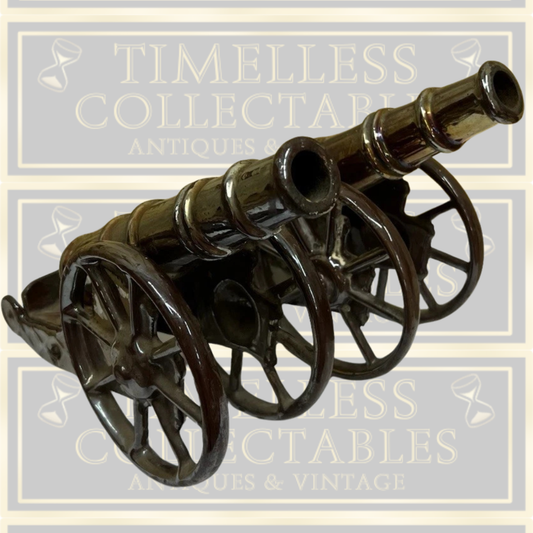 Vintage Large Cast Iron Lustre Cannon Ornaments