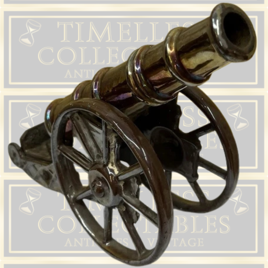 Vintage Large Cast Iron Lustre Cannon Ornaments