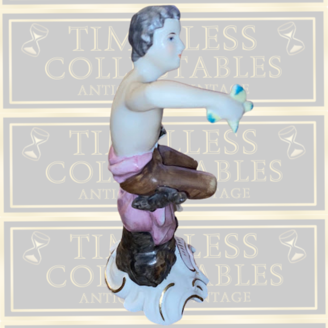 Vintage Porcelain Bird Man On Tree Trunk