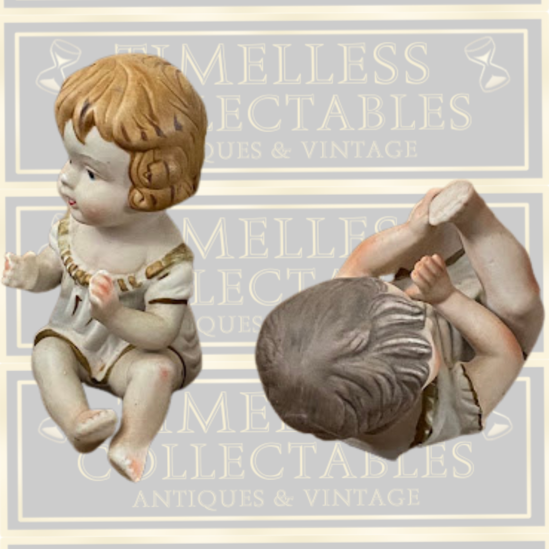 Vintage Pair German Bisque Porcelain Piano Baby Figurines