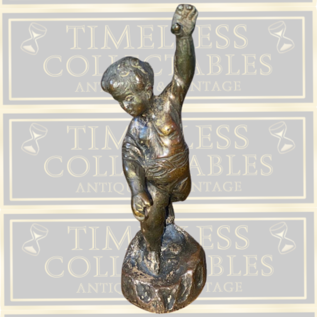 Antique bronze cherub figurine