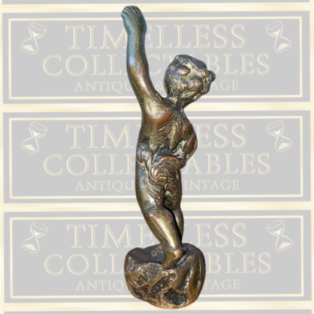 Antique bronze cherub figurine