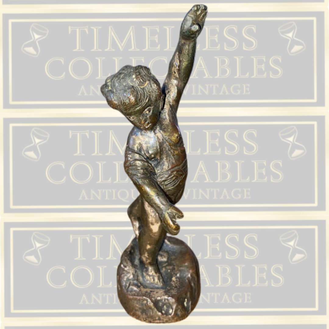 Antique bronze cherub figurine