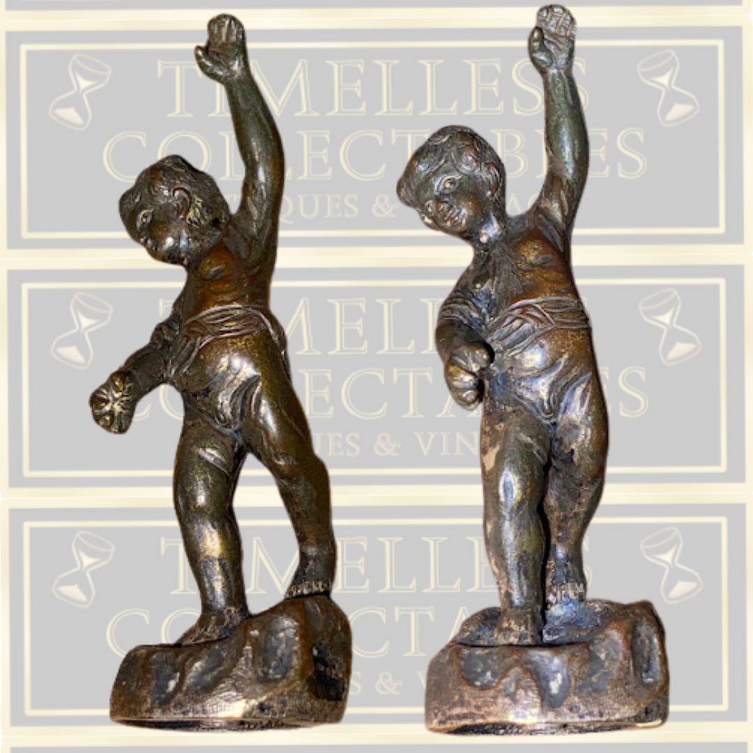 Antique bronze cherub figurine