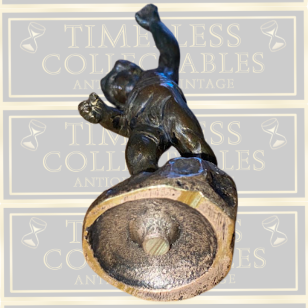 Antique bronze cherub figurine