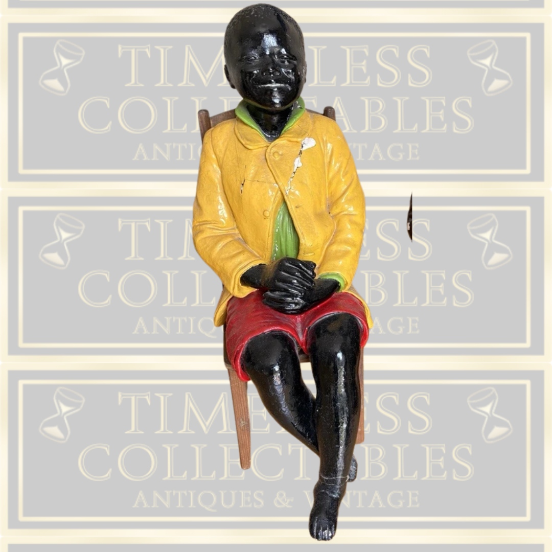 Antique Goldscheider Black Boy On A Wooden Chair