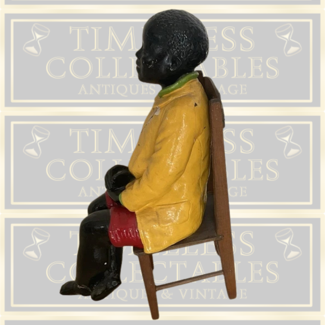 Antique Goldscheider Black Boy On A Wooden Chair