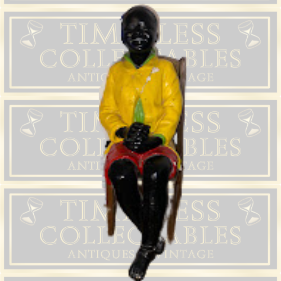 Antique Goldscheider Black Boy On A Wooden Chair