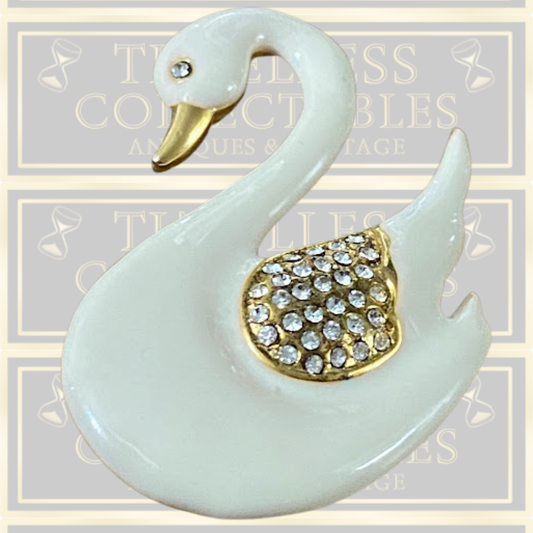 Vintage Gold-Plated Enamel Swan Brooch With Crystal-Encrusted Wings.