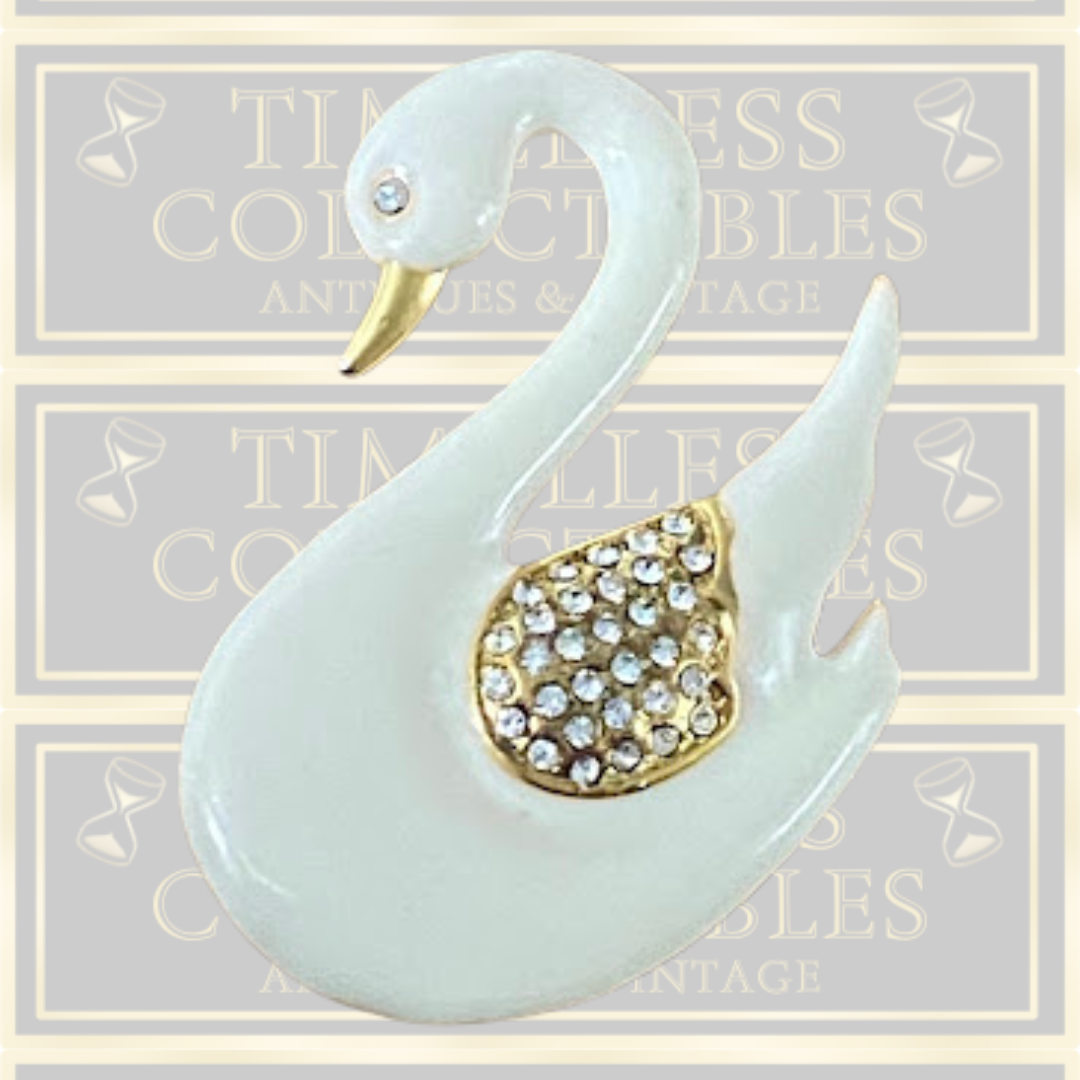 Vintage Gold-Plated Enamel Swan Brooch With Crystal-Encrusted Wings.