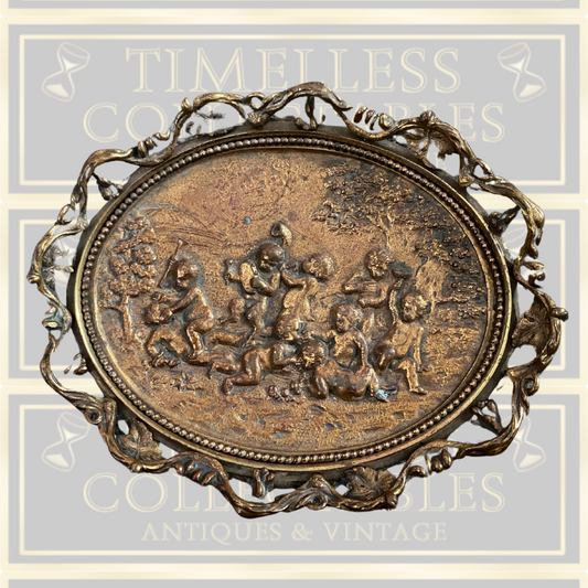 Antique cherub plaque