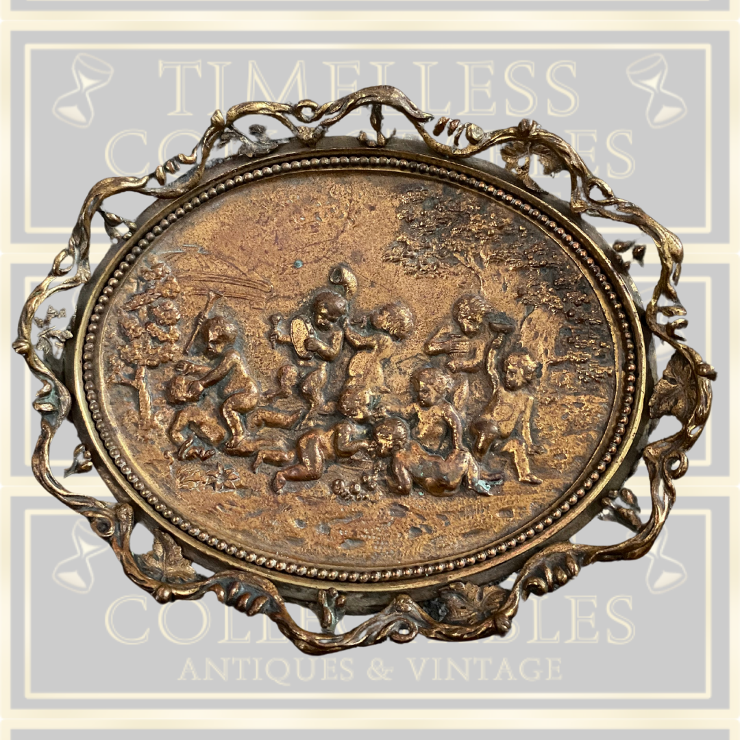 Antique cherub plaque